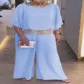Elegant light blue two-piece set featuring sequin batwing top and matching wide-leg pants - Sky Blue