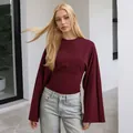 Elegant burgundy slim fit long sleeve top with round neck and dramatic flare sleeves - Burgundy