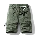 Men's olive green cotton cargo shorts featuring elastic drawstring waist and multi-pockets - S / Bottoms / Army Green