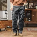 Men's dark grey multi-pocket cargo pants in American vintage style for outdoor wear - 29 / Bottoms / Gray