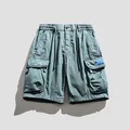Lockere Herren-Cargo-Shorts mit mehreren Taschen in Staubblau und Kordelzug-Design - Hellblau