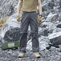 Men's loose techwear cargo pants with multi-pockets in dark grey variant - 29 / Bottoms / Gray