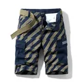 Men's cargo shorts with lightning bolt pattern and matching canvas belt in navy and tan - 30 / Bottoms / Sky Blue