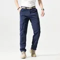 Men's vintage navy blue tactical cargo pants with multi-pocket design and straight leg fit - 30 / Bottoms / Blue