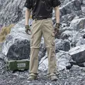 Men's loose fit khaki tactical cargo pants featuring multi-pockets and knee zipper detail - 29 / Bottoms / Khaki