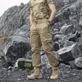 Men's loose khaki techwear cargo pants with multiple pockets and a drawstring waist - 28 / Bottoms / Khaki