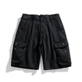 Pantalones cortos tipo cargo negros para hombre con múltiples bolsillos y diseño moderno - 29 / Bottoms / Negro