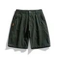 Pantalones cortos cargo retro para hombre en verde oscuro con bolsillos de algodón - 29 / Bottoms / Verde Militar
