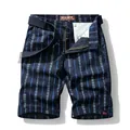Men's stylish navy blue cargo shorts with vertical pattern design and matching belt - 29 / Bottoms / Blue