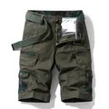 Men's olive green cargo shorts featuring camouflage accents and an adjustable matching belt - 29 / Bottoms / Army Green