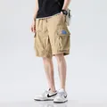 Pantalones cortos cargo caqui holgados para hombre con múltiples bolsillos - 28 / Bottoms / Caqui
