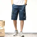 Vintage navy blue cargo shorts for men with camouflage pockets in a loose street style - 38 / Bottoms / Sky Blue