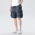 Pantalones cortos tipo cargo para hombre en gris oscuro con múltiples bolsillos - 28 / Bottoms / Gris oscuro
