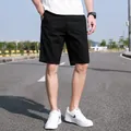 Pantalones cortos cargo negros para hombre de verano con un ajuste ligero y holgado - 28 / Bottoms / Negro
