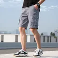 Casual men's loose fit cotton cargo shorts featuring multiple pockets in a classic grey color - 30 / Bottoms / Light Gray