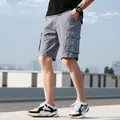 Casual men's loose fit cotton cargo shorts featuring multiple pockets in a classic grey color - 30 / Bottoms / Light Gray