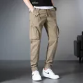 Men's khaki multi-pocket cargo pants with drawstring waist and elastic cuffs - 29 / Bottoms / Khaki