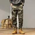 Men's retro camouflage cargo pants with multi-pockets and elastic jogger cuffs. - 29 / Bottoms / Khaki
