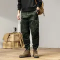 Men's vintage dark green camo cargo pants featuring jogger cuffs and multi-pockets - 29 / Bottoms / Army Green