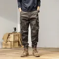 Men's stylish retro camouflage cargo jogger pants with multiple pockets in deep camo print - 38 / Bottoms / Gray