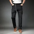Men's multi-pocket tactical cargo pants in black featuring a relaxed fit and durable fabric - M / Bottoms / Black