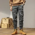 American retro style men's grey cargo pants featuring multi-pockets and elastic cuffs - 29 / Bottoms / Gray