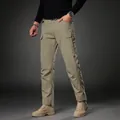 Men's vintage loose khaki cargo pants with multiple tactical pockets for outdoor sports - M / Bottoms / Khaki