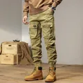 Men's vintage khaki cargo pants with multiple pockets and elastic cuffs for a trendy look - 29 / Bottoms / Khaki