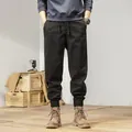 Men's Japanese retro black elastic cargo pants, ideal for outdoor and casual wear. - 29 / Bottoms / Black