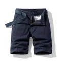 Men's loose navy blue cotton cargo shorts featuring a matching woven belt and pockets - 29 / Bottoms / Dark Blue