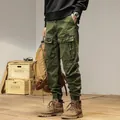 Men's vintage olive green cargo pants with multi-pocket design and elasticated cuffs - 29 / Bottoms / Army Green