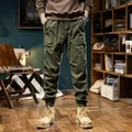 Men's retro olive cargo pants with warm fleece lining and elastic cuffs - 28 / Bottoms / Army Green