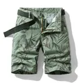 Stylish men's summer loose cargo shorts featuring a tropical leaf pattern and matching belt - 29 / Bottoms / Light Green