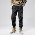 Men's winter fleece-lined cargo pants with elastic cuffs in black vintage style - 28 / Bottoms / Black