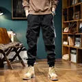 Men's retro black fleece-lined cargo joggers featuring drawstring and multiple pockets - 28 / Bottoms / Black