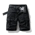 Vintage black men's cargo shorts featuring multi-pocket design and adjustable belt accessory - 29 / Bottoms / Black