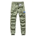 Men's olive green cargo jogger pants with multiple pockets and ankle zippers. - 28 / Bottoms / Army Green