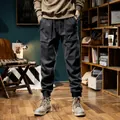 Men's retro charcoal grey fleece-lined cargo joggers with elastic cuffs - 28 / Bottoms / Gray