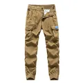 Men's khaki cargo jogger pants with multi-pockets and adjustable zipper cuffs - Camel