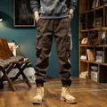 Men's retro dark brown cargo joggers featuring warm fleece lining and elastic drawstring waist - 28 / Bottoms / Coffee