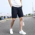 Men's vintage navy blue casual cargo shorts with drawstring waist and loose fit style - 29 / Bottoms / Dark Blue