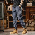 Men's blue jogger cargo pants with multiple pockets and elastic cuffs - 28 / Bottoms / Gray