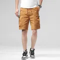 Short cargo marron pour homme avec poches zippées, cordon de serrage et tissu extensible - 28 / Bas / Kaki