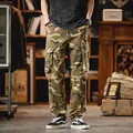 Vintage camouflage cargo pants with multiple pockets for men in a comfortable loose fit - 28 / Bottoms / Khaki
