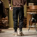 Premium men's black American retro fleece cargo pants back view for winter warmth - 28 / Bottoms / Black