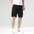 Short cargo noir décontracté pour hommes avec plusieurs poches et taille à cordon - 28 / Bas / Noir