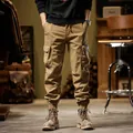 Heavyweight American vintage khaki cargo pants for men featuring a warm fleece lining - 28 / Bottoms / Camel