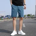 Men's casual loose-fit retro cargo shorts in teal blue, perfect for stylish everyday summer wear - 28 / Bottoms / Dark Blue