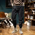 High-quality men's black fleece-lined cargo pants with a warm mountain style design - 28 / Bottoms / Black