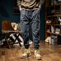 Casual men's outdoor mountain style grey cargo pants with warm fleece lining and elastic cuffs - 28 / Bottoms / Gray